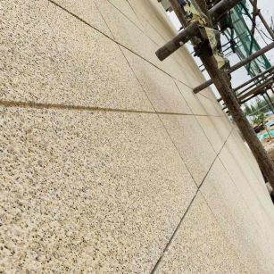 延安 黄金麻花岗岩荔枝面外墙干挂石材效果示例