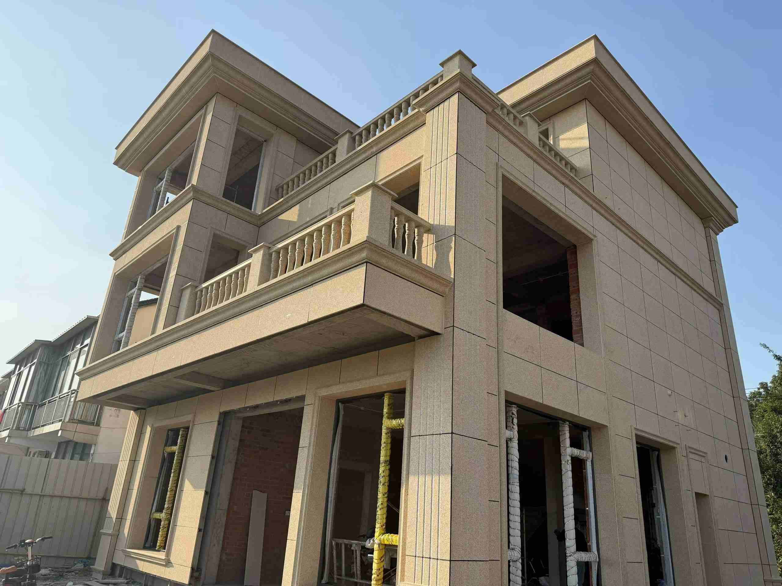 延安 黄金麻花岗岩石材荔枝面外墙干挂效果展示