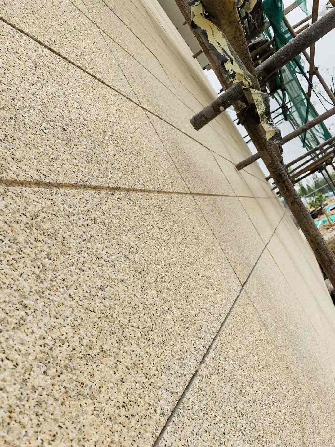 延安 黄金麻花岗岩荔枝面外墙干挂石材效果示例